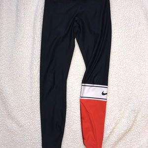 Nike leggings with orange accent